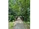 A beautiful walking bridge is nestled within a wooded setting, inviting residents to explore nature trails at 1181 Church St # G, Decatur, GA 30030