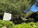 Decatur Square Condominiums sign nestled amidst lush trees near attractive landscaping at 1181 Church St # G, Decatur, GA 30030