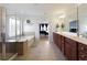 Large bathroom offering double sinks, a separate shower and tub, connecting to the main bedroom at 301 Ridgewood Trl, Canton, GA 30115