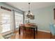Bright breakfast nook with hardwood floors, neutral colors, and natural light at 301 Ridgewood Trl, Canton, GA 30115