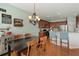 Eat-in kitchen area featuring wood table, chairs, hardwood floors, and neutral colored walls at 301 Ridgewood Trl, Canton, GA 30115