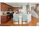 Updated kitchen with granite countertops, stainless steel appliances, and breakfast bar at 301 Ridgewood Trl, Canton, GA 30115