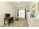 Bright and airy office space with a large window and functional decor at 301 Ridgewood Trl, Canton, GA 30115