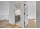 Bathroom featuring a grey vanity, a framed mirror and hard surface floors at 3085 Jackson St, Hapeville, GA 30354