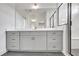 Bathroom with dual sinks and glass shower at 3085 Jackson St, Hapeville, GA 30354