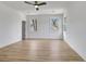 Spacious bedroom features hardwood floors, white walls, and ceiling fan at 3085 Jackson St, Hapeville, GA 30354