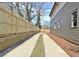 Long driveway beside the house and fenced in on the other side, offering ample parking space at 3085 Jackson St, Hapeville, GA 30354