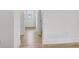 Inviting hallway featuring hardwood floors and an open view through the house at 3085 Jackson St, Hapeville, GA 30354