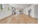 Open concept living space, seamlessly connects the living, dining, and kitchen areas, with lots of natural light at 3085 Jackson St, Hapeville, GA 30354