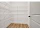 Pantry features wire shelving, plenty of storage, and a neutral color scheme at 3085 Jackson St, Hapeville, GA 30354