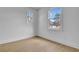 Bedroom with hardwood floors and natural light from two windows at 3163 Old Jonesboro Rd, Hapeville, GA 30354