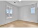 Bright bedroom with natural light and wood floors, freshly painted in neutral tones at 3163 Old Jonesboro Rd, Hapeville, GA 30354