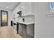 Stylish kitchen featuring stainless appliances, marble countertops, and modern cabinetry at 3163 Old Jonesboro Rd, Hapeville, GA 30354
