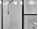 Shower featuring white subway tile, a bronze shower head, and a mosaic tile floor at 3163 Old Jonesboro Rd, Hapeville, GA 30354