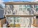 Exterior view of the house with fenced yard and sliding doors that lead to the inside at 495 Duval Dr, Alpharetta, GA 30009