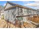 Exterior view of the house with fenced yard, patio and air conditioning unit at 495 Duval Dr, Alpharetta, GA 30009