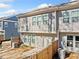 Exterior view of the house showing patio, yard, fence and air conditioning unit at 495 Duval Dr, Alpharetta, GA 30009