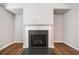 Elegant fireplace with a white mantel and black hearth, perfect for a cozy living space at 495 Duval Dr, Alpharetta, GA 30009