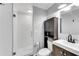 Bathroom featuring a glass door shower, modern vanity with black fixtures, and gray paint at 681 Home Se Ave, Atlanta, GA 30312