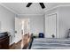 Bright bedroom features hardwood floors and large closet space for ample storage at 681 Home Se Ave, Atlanta, GA 30312