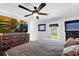 Comfortable bedroom features a television and a door to the outside area at 681 Home Se Ave, Atlanta, GA 30312