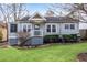 Charming bungalow featuring a well-maintained front lawn, covered porch, and welcoming curb appeal at 681 Home Se Ave, Atlanta, GA 30312