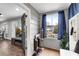 Versatile sunroom offering storage, natural light, and seamless connectivity to the main living space at 681 Home Se Ave, Atlanta, GA 30312