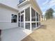 View of a large screened-in porch, perfect for enjoying the outdoors at 1327 Fern Ridge Ct # 27, Norcross, GA 30093