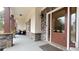 Inviting front porch with stone pillars and a glass-paneled door at 7460 Highway 101, Rockmart, GA 30153