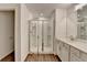 Bathroom features include a modern glass-enclosed shower with white tiles, and a neutral color palette at 4118 Haleston Rd, Duluth, GA 30097