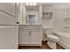 Bathroom features a sleek vanity, modern fixtures, and a combination tub/shower at 4118 Haleston Rd, Duluth, GA 30097