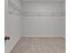 Walk-in closet with metal shelving provides ample storage space for an organized wardrobe at 4118 Haleston Rd, Duluth, GA 30097