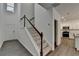 Spacious entryway with stairs, and luxury vinyl flooring at 4118 Haleston Rd, Duluth, GA 30097