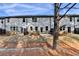 Rear exterior of townhome units with patios at 4118 Haleston Rd, Duluth, GA 30097