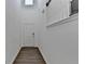 Inviting hallway with luxury vinyl flooring and neutral paint at 4118 Haleston Rd, Duluth, GA 30097