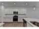 Kitchen with stainless steel appliances, including a microwave and gas range at 4118 Haleston Rd, Duluth, GA 30097