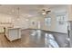 Open concept living room featuring luxury vinyl flooring, recessed lighting, and ceiling fan at 4118 Haleston Rd, Duluth, GA 30097