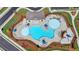 Aerial view of community pool featuring splash pad, lounge chairs, and landscaping at 4118 Haleston Rd, Duluth, GA 30097
