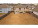 Spacious backyard with a patio, perfect for outdoor dining and relaxation at 4480 Sunflower Cir, Cumming, GA 30040