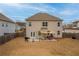 Spacious backyard with a patio, perfect for outdoor dining and relaxation at 4480 Sunflower Cir, Cumming, GA 30040