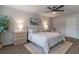 Comfortable main bedroom featuring calming decor, soft lighting, and stylish furnishings at 4480 Sunflower Cir, Cumming, GA 30040