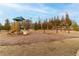Community playground with swings, slide, and play structure at 4480 Sunflower Cir, Cumming, GA 30040