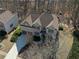 Aerial view of the home showing a well-maintained roof and mature trees at 7290 Weber St, Atlanta, GA 30349