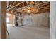 Unfinished basement with exposed ceiling and concrete walls at 7290 Weber St, Atlanta, GA 30349