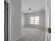 Bedroom featuring neutral paint, carpet and a window at 7290 Weber St, Atlanta, GA 30349
