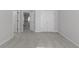Bedroom featuring neutral paint, plush carpeting, and closet at 7290 Weber St, Atlanta, GA 30349