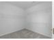Walk-in closet featuring neutral carpet and wire shelving at 7290 Weber St, Atlanta, GA 30349