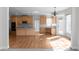 Well-lit kitchen boasts an island, stainless steel appliances, and hardwood floors at 7290 Weber St, Atlanta, GA 30349