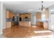 Spacious kitchen features wooden cabinets, a kitchen island and stainless appliances at 7290 Weber St, Atlanta, GA 30349