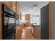 Modern kitchen with stainless steel appliances and granite countertops at 7290 Weber St, Atlanta, GA 30349